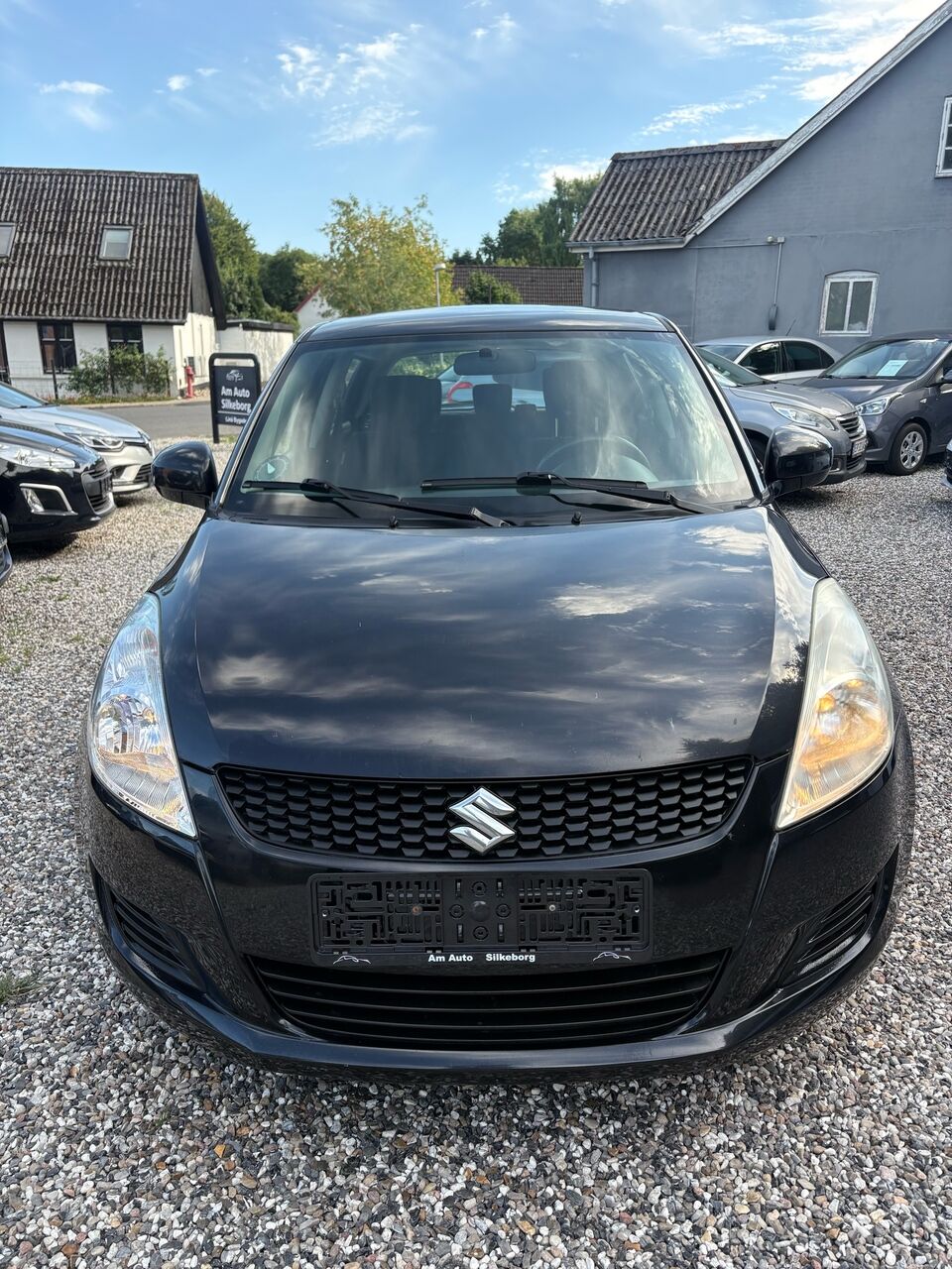 
								Suzuki Swift 1,2 16V GL 94HK 5d full									